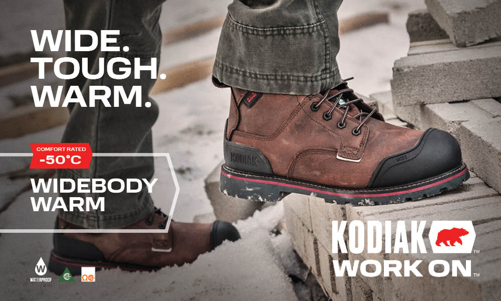Kodiak Work On boots on a snowy ground with branding and text.
